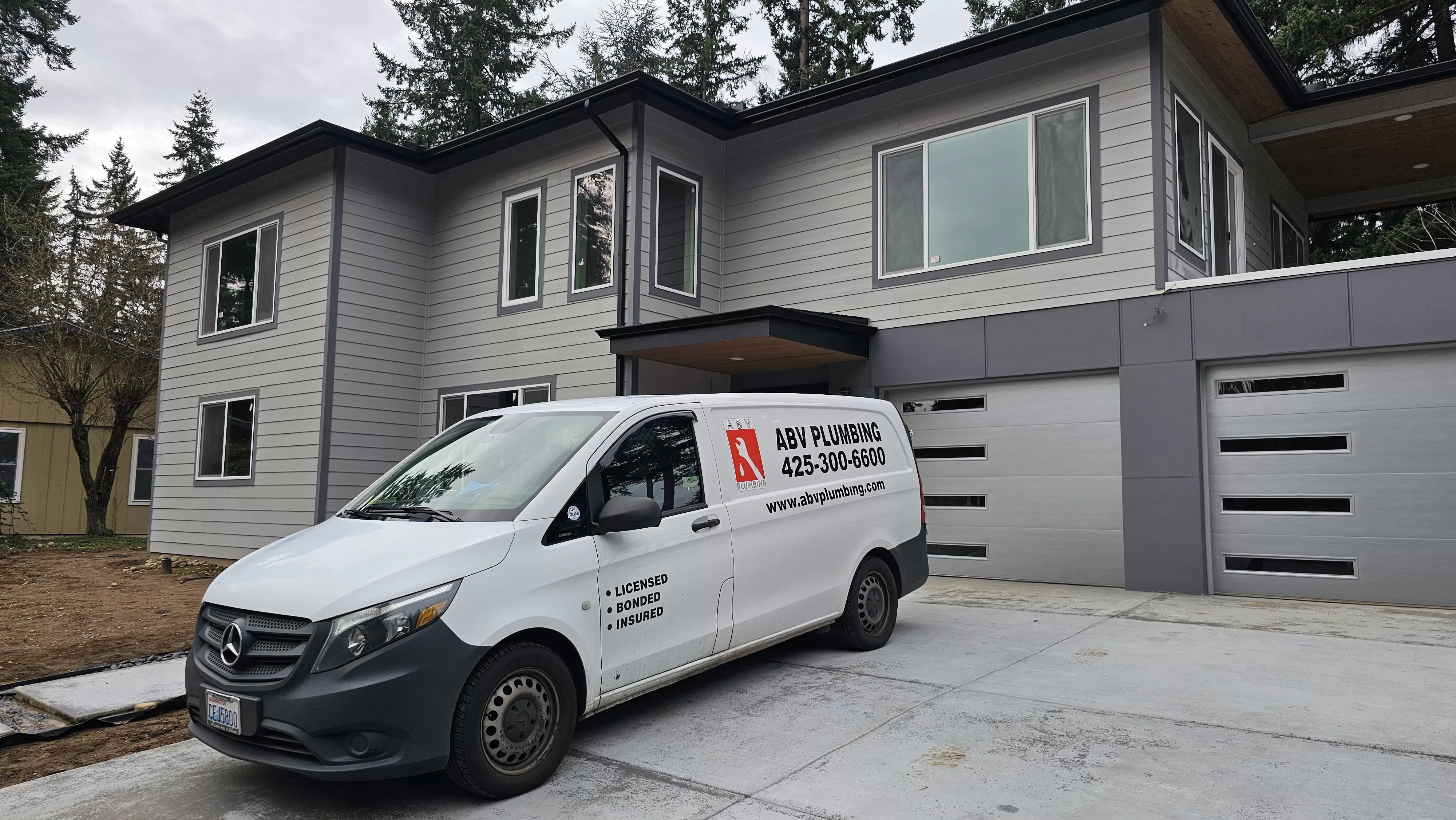 company van with logo and phone number